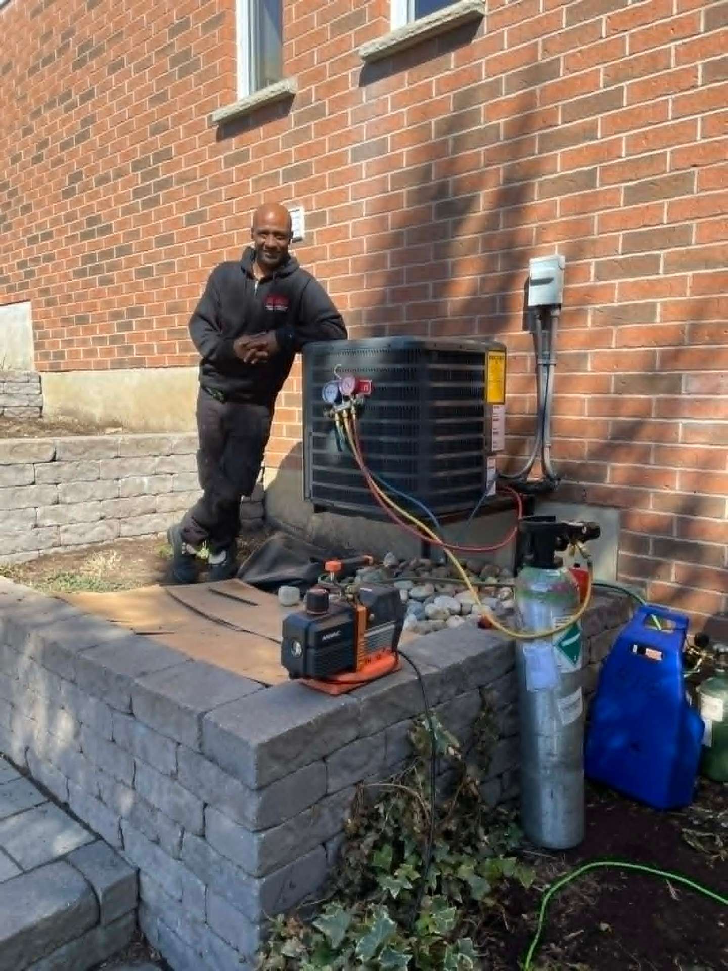 Owner of Draco Heating and Cooling on a job site in Kitchener-Waterloo